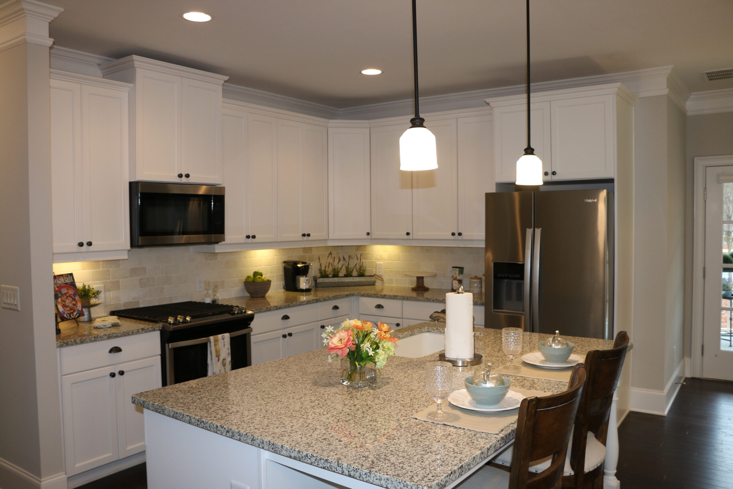 Kitchen Island of Water Oak Cottage at Sterling Estates