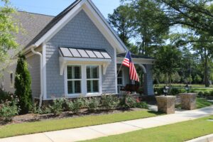 Outdoor View of a Sterling Estates Cottage with Flowers in Front