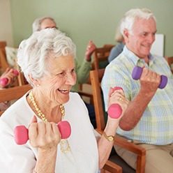 Seniors doing strength building exercise