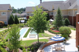 Shuffleboard courts and courtyard between the Hampton and Stratford apartment residences